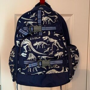 Pottery Barn Kids Large dinosaur glow in the dark backpack.
